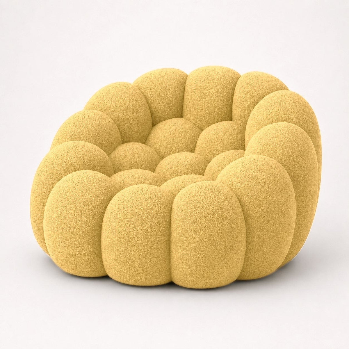 Fauteuil Rousseau en maille bouclette Jaune miel, vu de profil sur fond studio — Orbe Paris