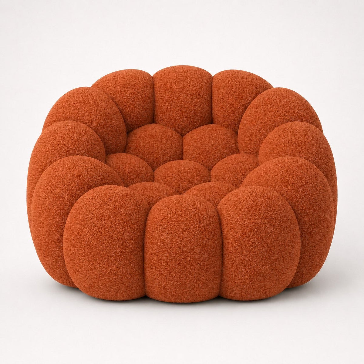 Fauteuil Rousseau en maille bouclette Terracotta, vu de face sur fond studio — Orbe Paris