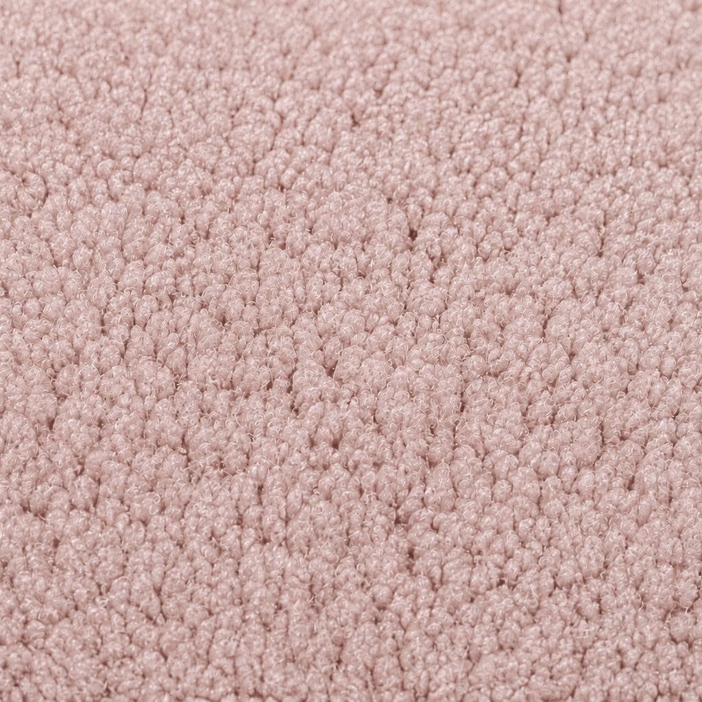 Gros plan de la maille bouclette Orbe Paris, coloris Rose poudré