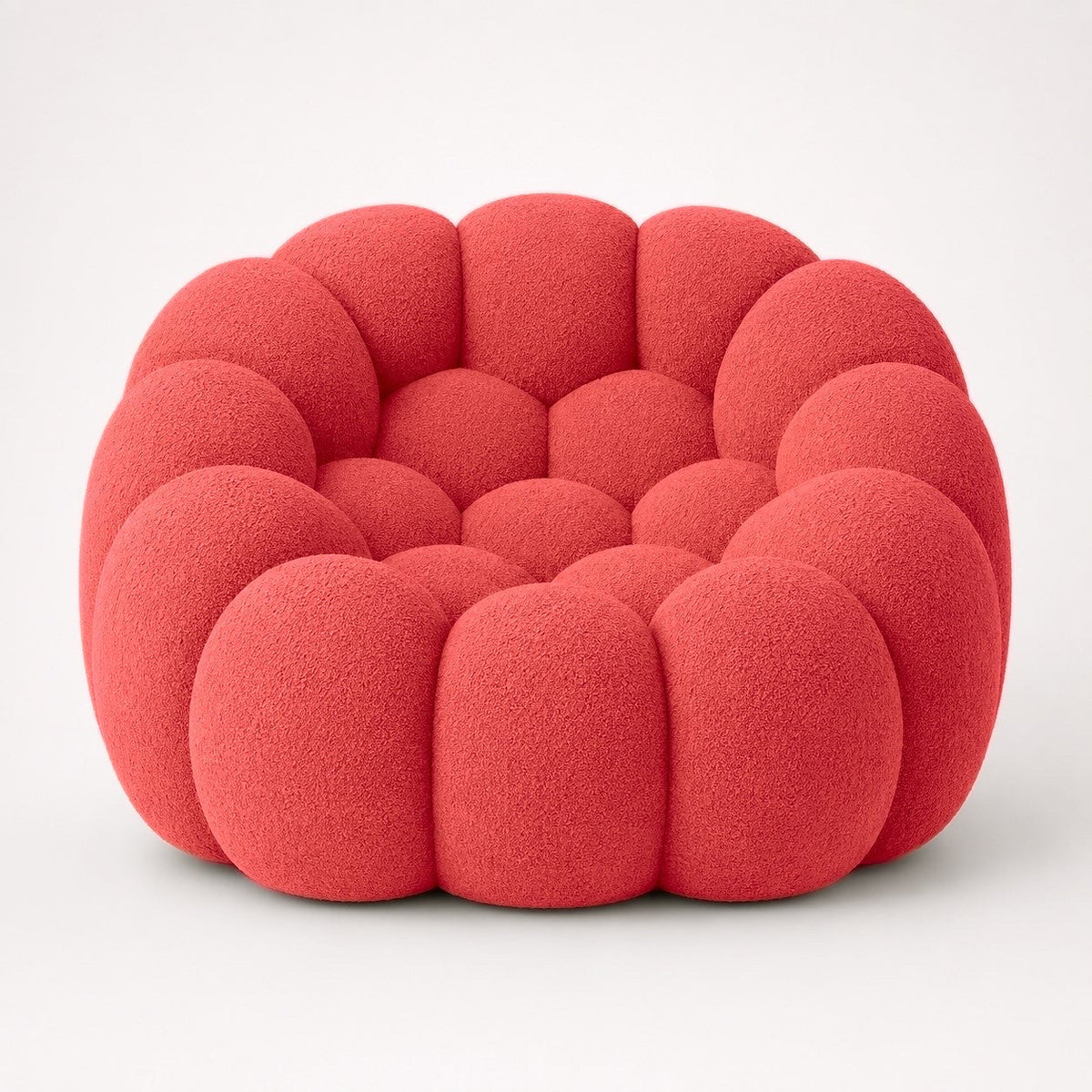 Fauteuil Rousseau en maille bouclette Rouge corail, vu de face sur fond studio — Orbe Paris