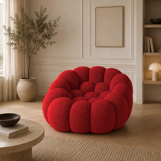 Fauteuil Rousseau en maille bouclette Rouge profond, mis en scène dans un salon — Orbe Paris