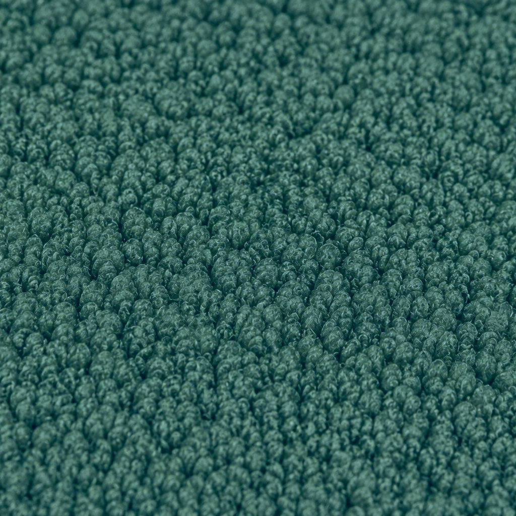Gros plan de la maille bouclette Orbe Paris, coloris Vert canard