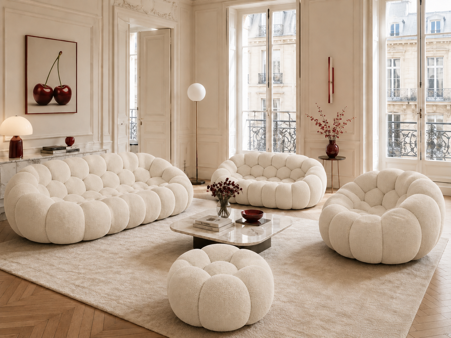 Canapé Rousseau, fauteuil et pouf Blanc cassé dans un salon parisien lumineux — Orbe Paris