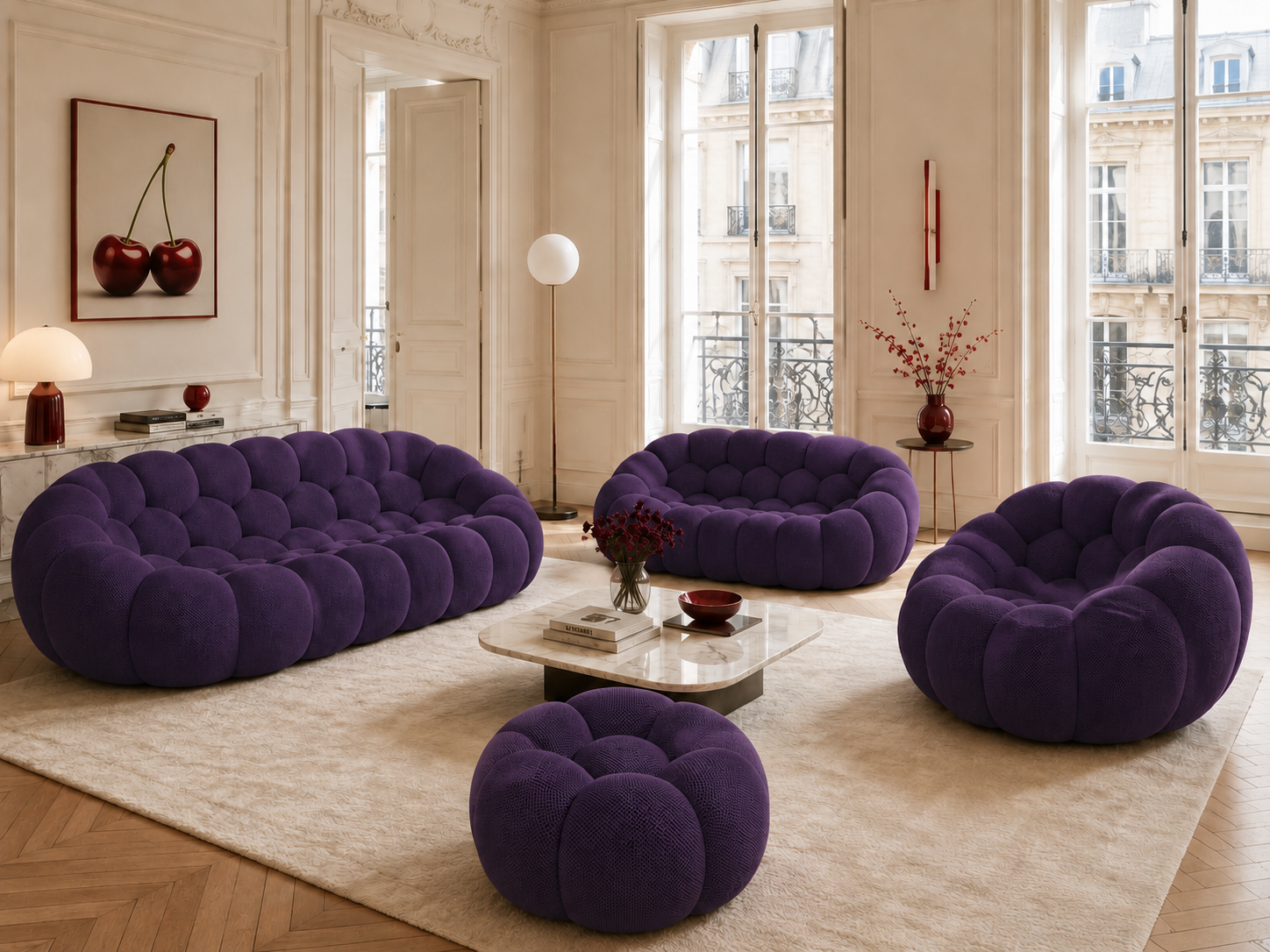 Canapé Rousseau, fauteuil et pouf Violet foncé dans un salon parisien lumineux — Orbe Paris