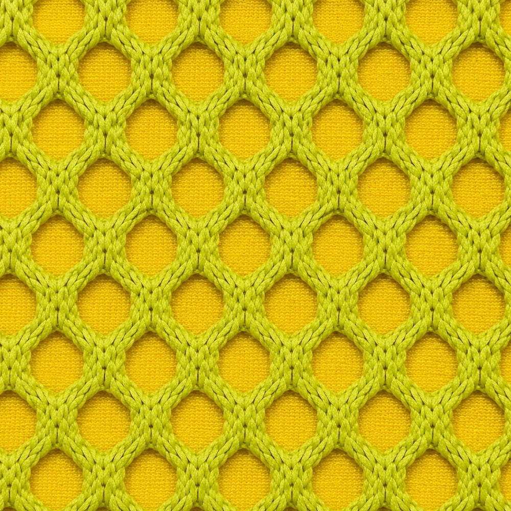 Gros plan du tissu maille 3D Orbe Paris — coloris Jaune fluo / anis