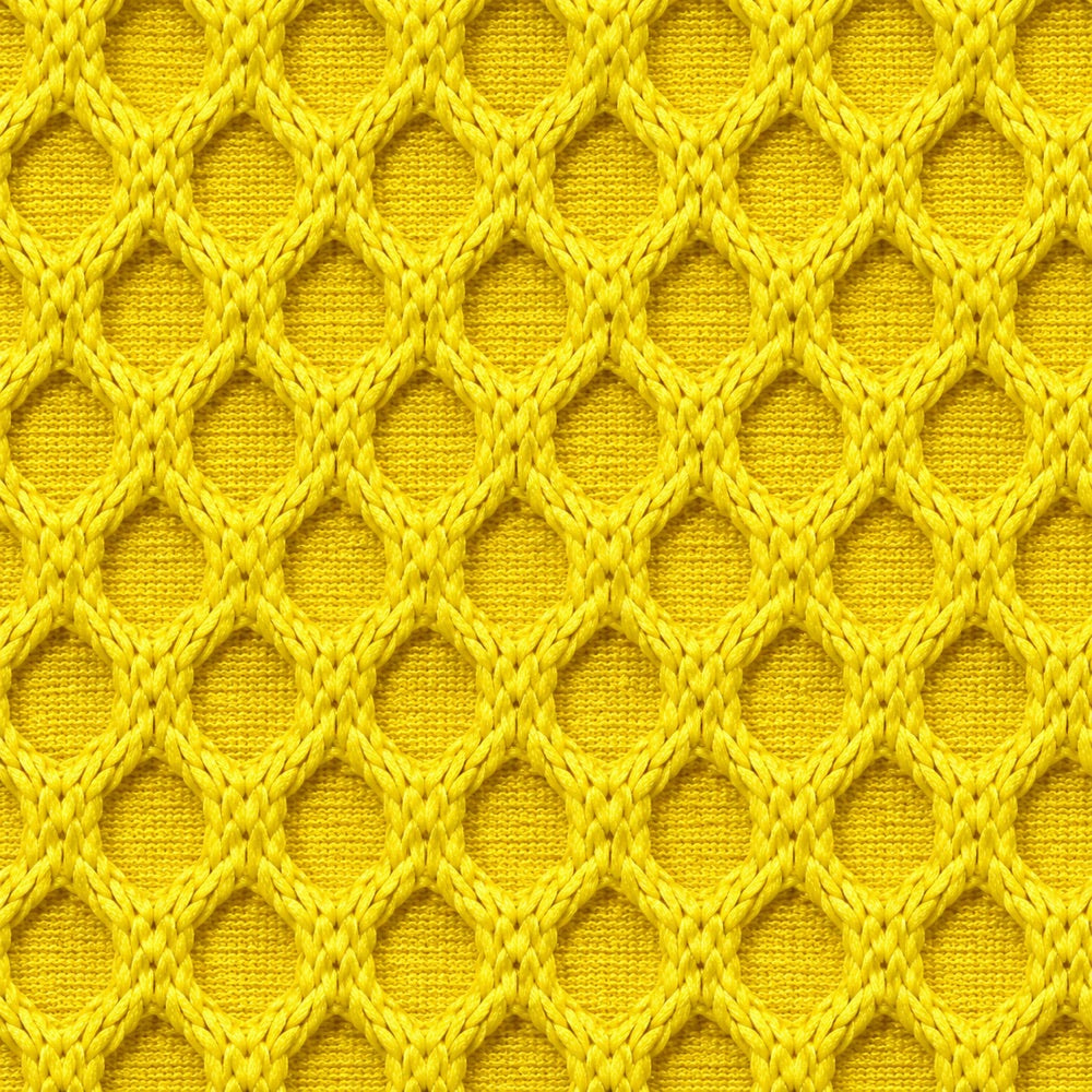 Gros plan du tissu maille 3D Orbe Paris — coloris Jaune vif chaud
