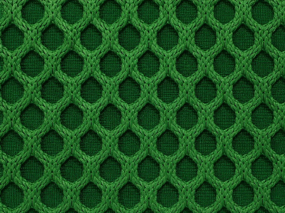 Gros plan du tissu maille 3D Orbe Paris — coloris Vert forêt