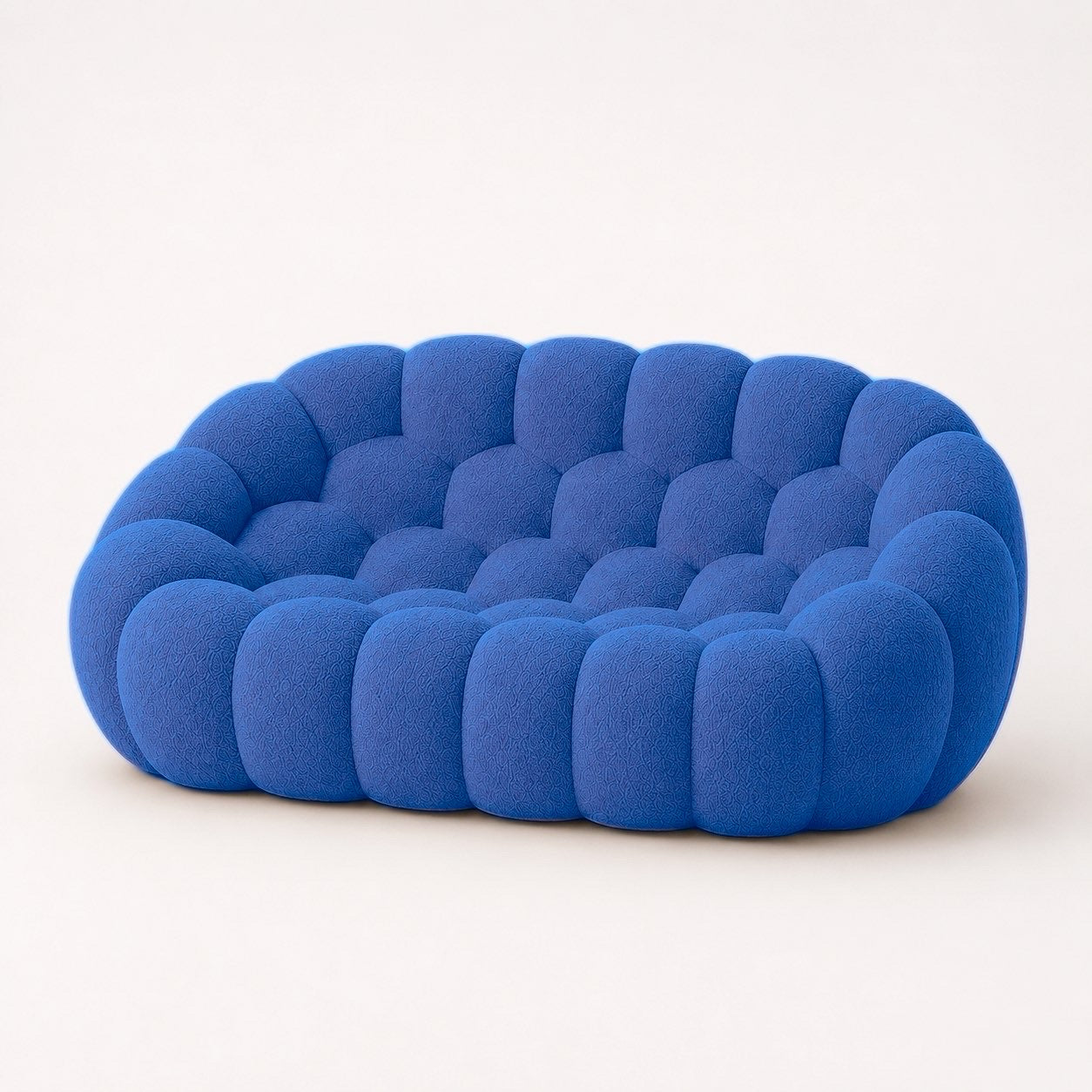 Canapé Rousseau 2-3 places en maille bouclette Bleu roi, vu de profil sur fond studio — Orbe Paris