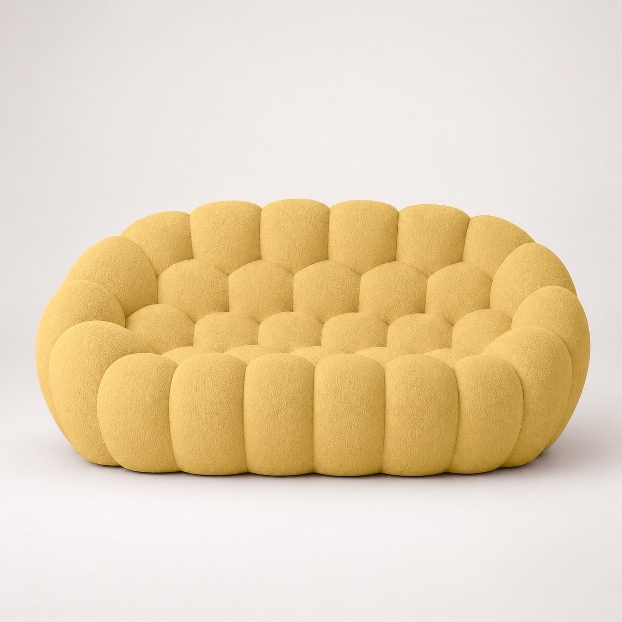 Canapé Rousseau 2-3 places en maille bouclette Jaune miel, vu de face sur fond studio — Orbe Paris