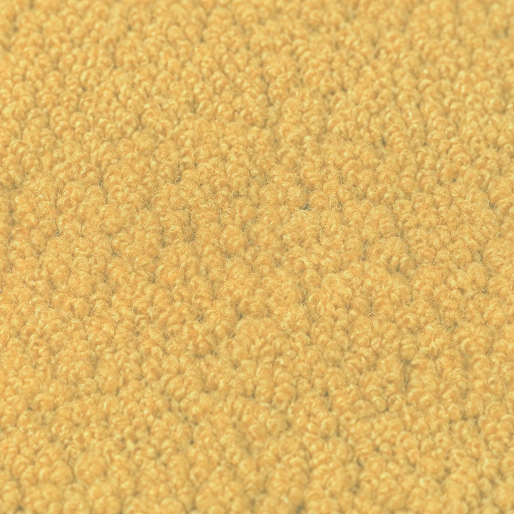 Gros plan de la maille bouclette Orbe Paris, coloris Jaune miel