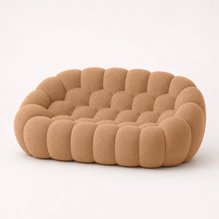 Canapé Rousseau 2-3 places en maille bouclette Camel, vu de profil sur fond studio — Orbe Paris