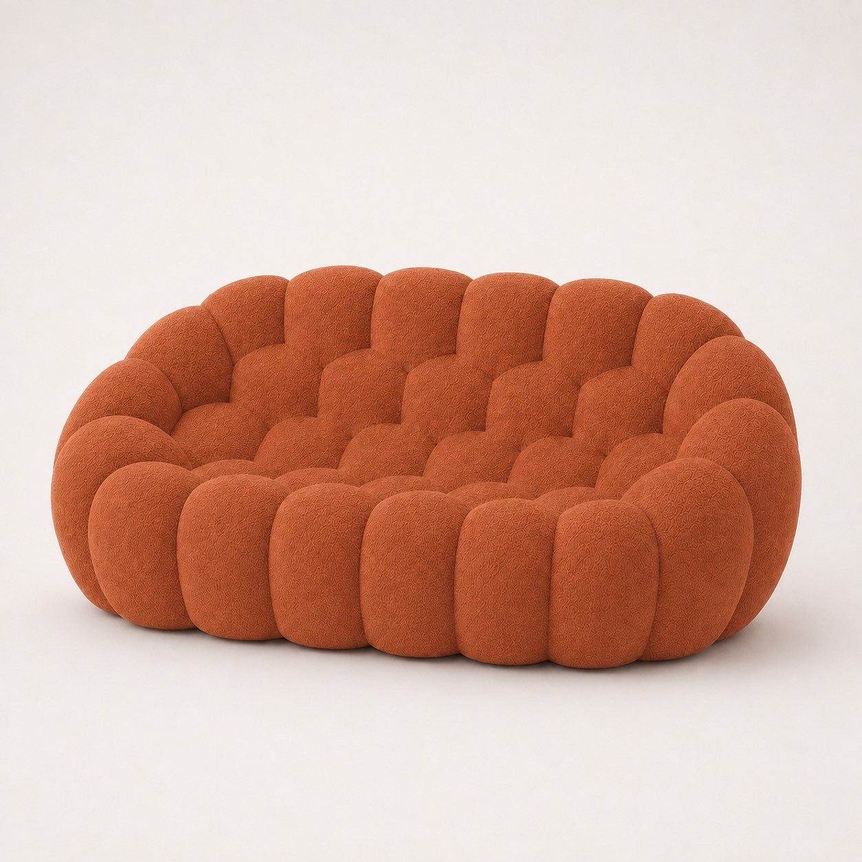 Canapé Rousseau 2-3 places en maille bouclette Terracotta, vu de profil sur fond studio — Orbe Paris