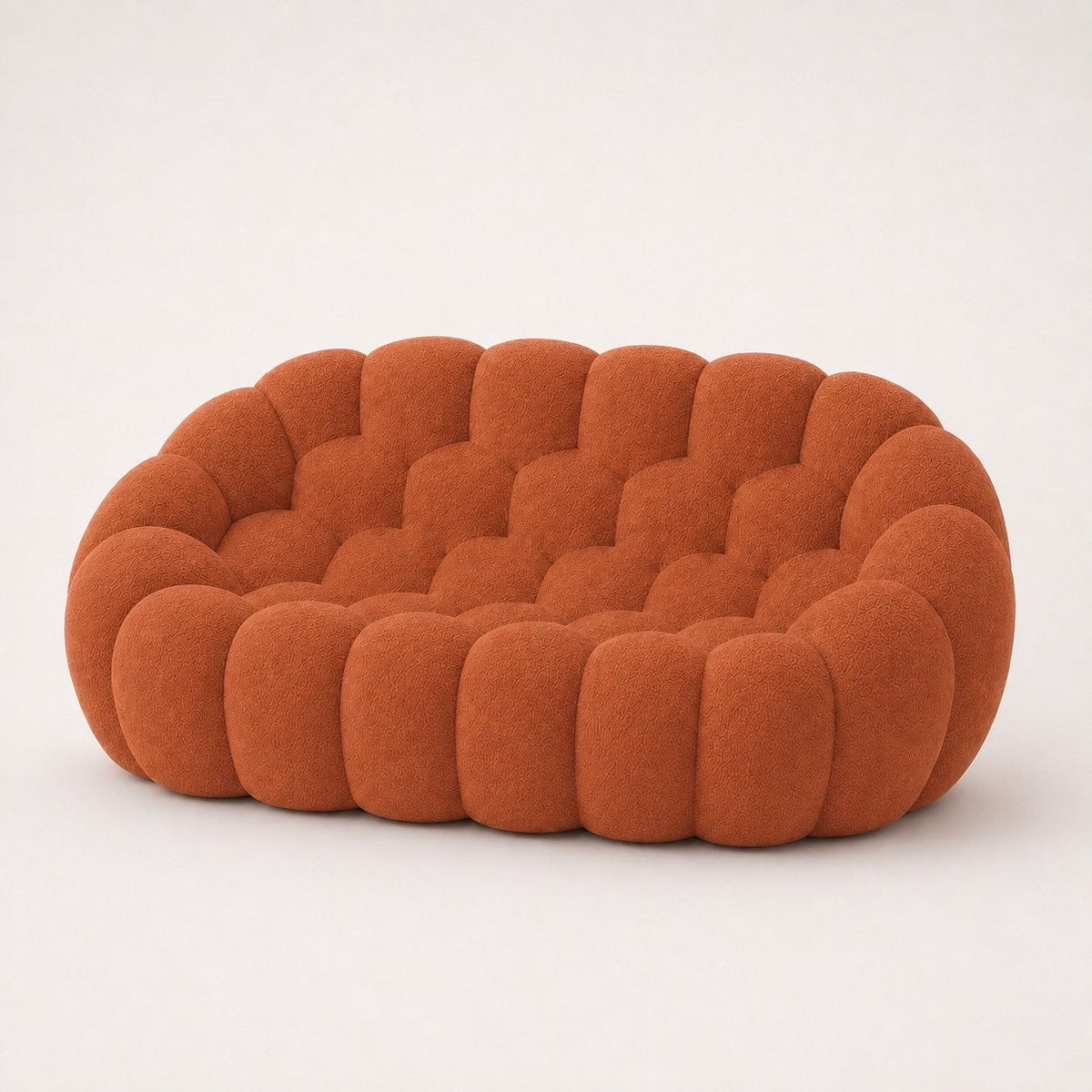 Canapé Rousseau 2-3 places en maille bouclette Terracotta, vu de profil sur fond studio — Orbe Paris