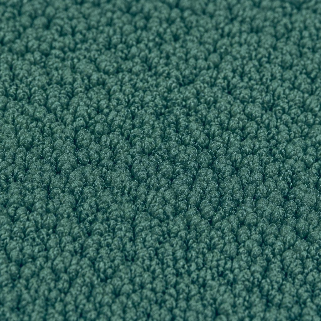 Gros plan de la maille bouclette Orbe Paris, coloris Vert canard