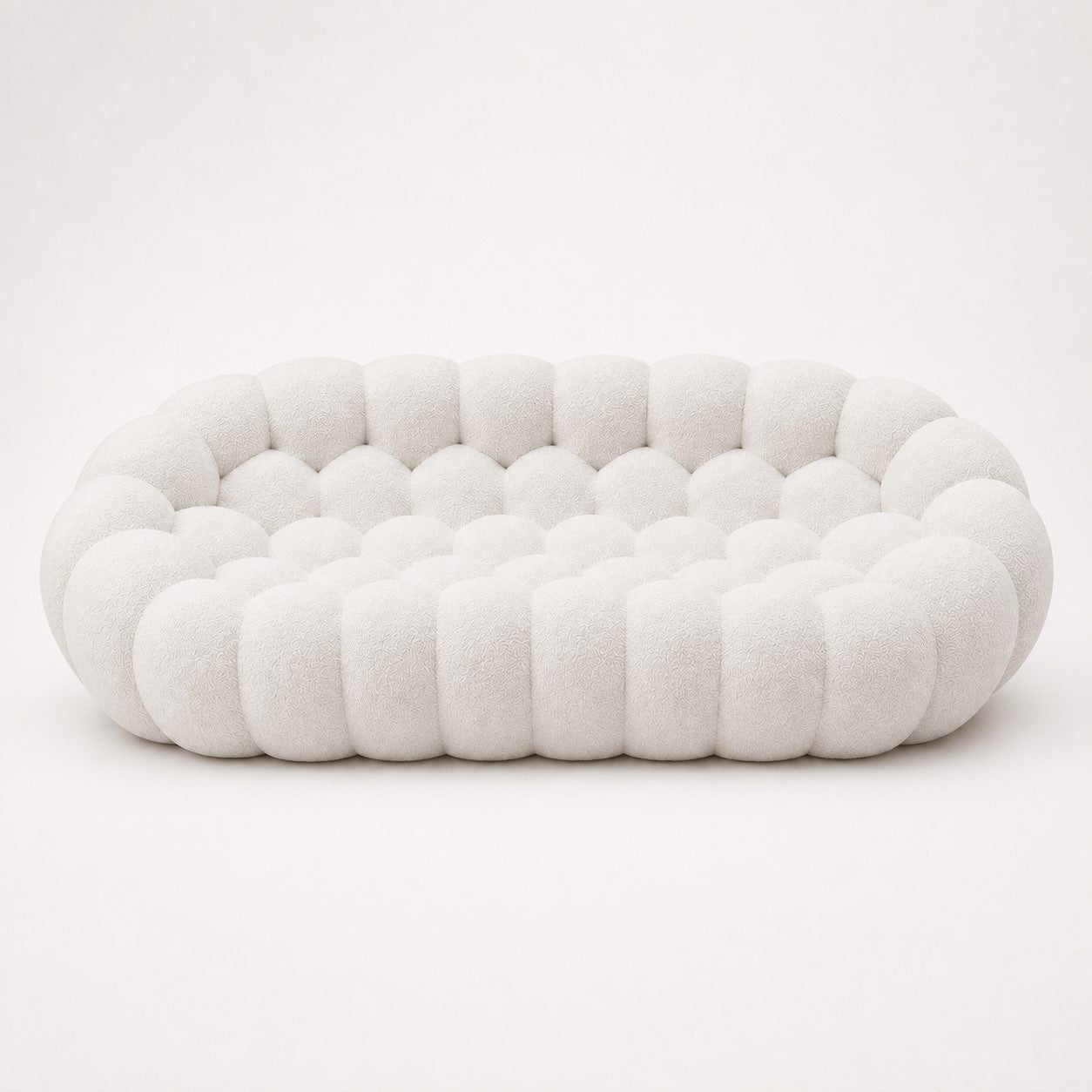 Canapé Rousseau 3-4 places en maille bouclette Blanc cassé, vu de face sur fond studio — Orbe Paris