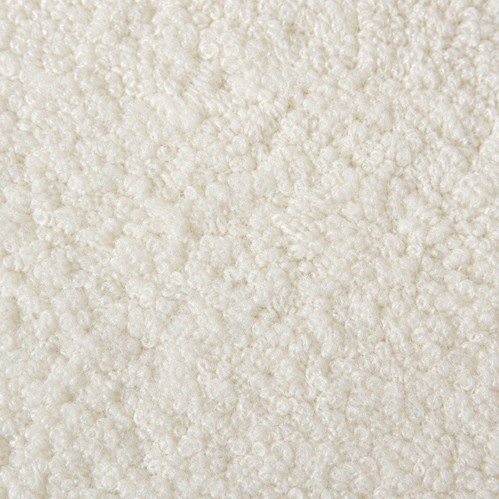 Gros plan de la maille bouclette Orbe Paris, coloris Blanc cassé