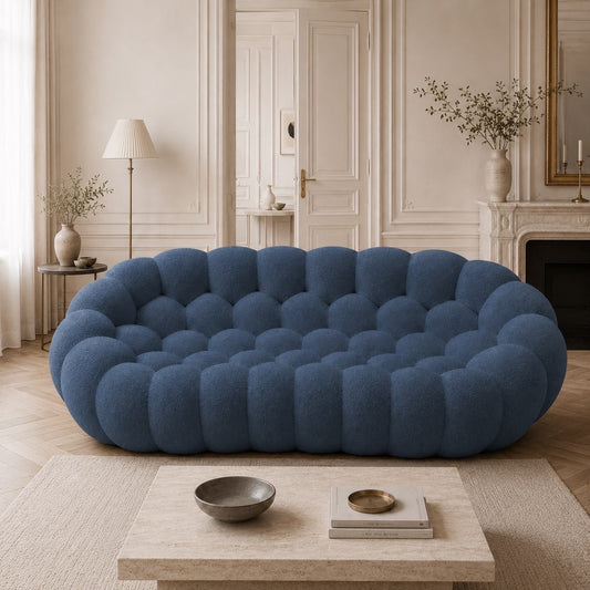 Canapé Rousseau 3-4 places en maille bouclette Bleu gris, mis en scène dans un salon — Orbe Paris
