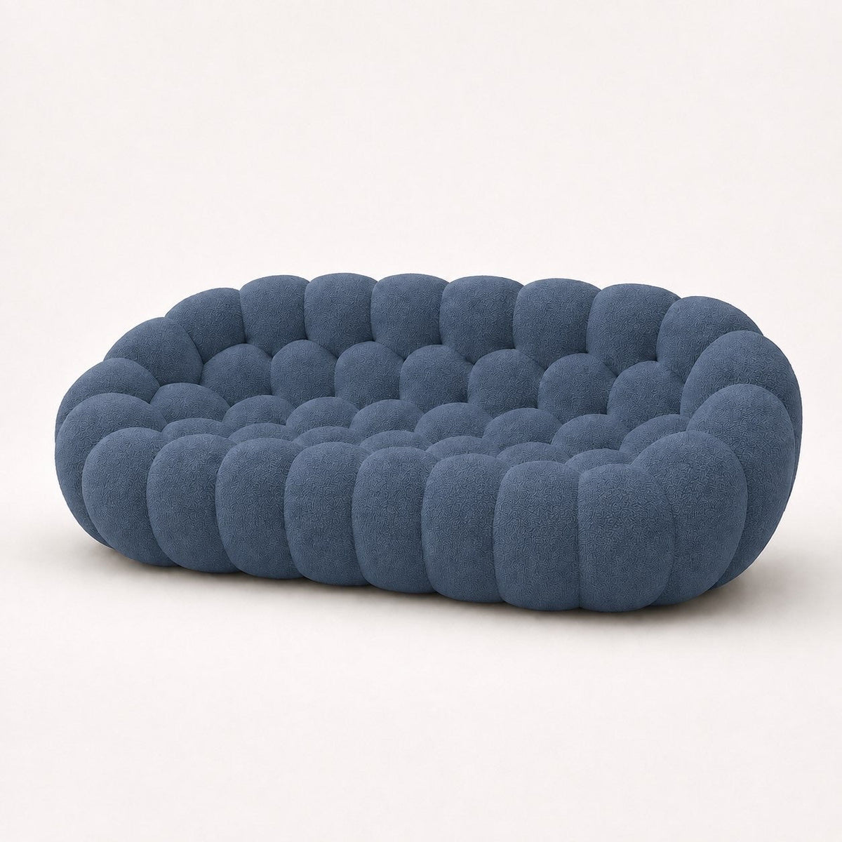 Canapé Rousseau 3-4 places en maille bouclette Bleu gris, vu de profil sur fond studio — Orbe Paris