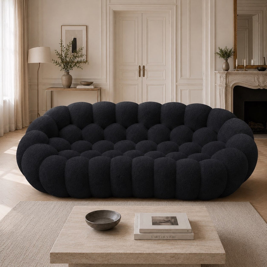 Canapé Rousseau 3-4 places en maille bouclette Noir, mis en scène dans un salon — Orbe Paris
