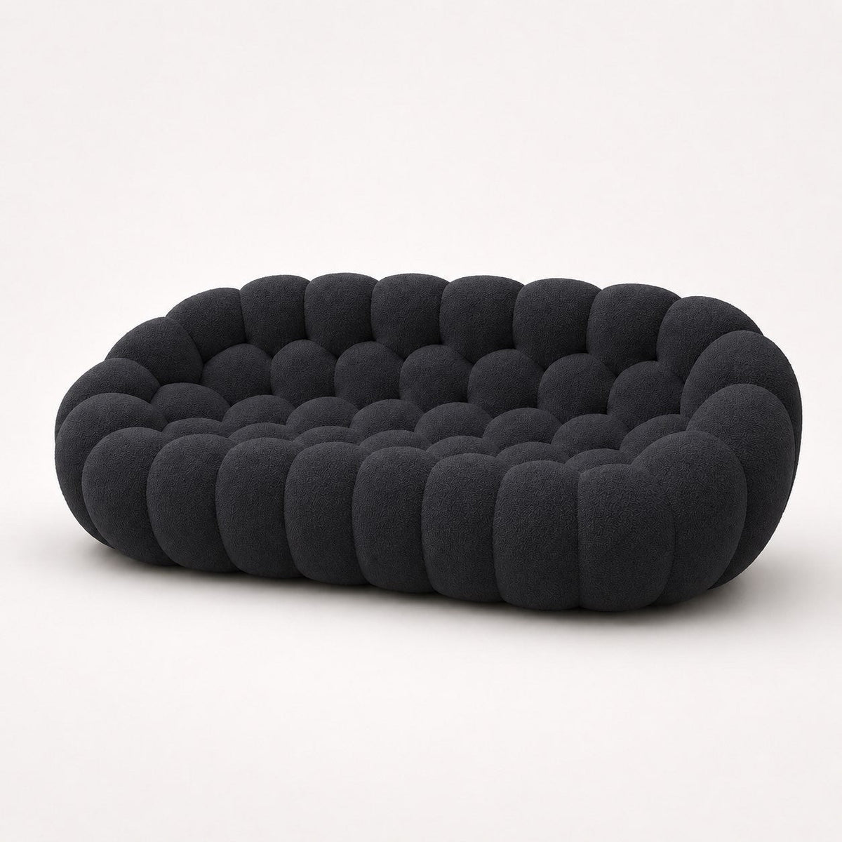 Canapé Rousseau 3-4 places en maille bouclette Noir, vu de profil sur fond studio — Orbe Paris