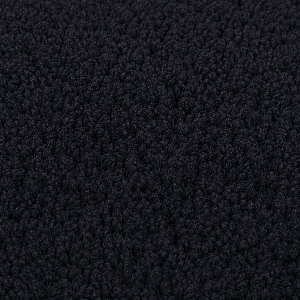 Gros plan de la maille bouclette Orbe Paris, coloris Noir