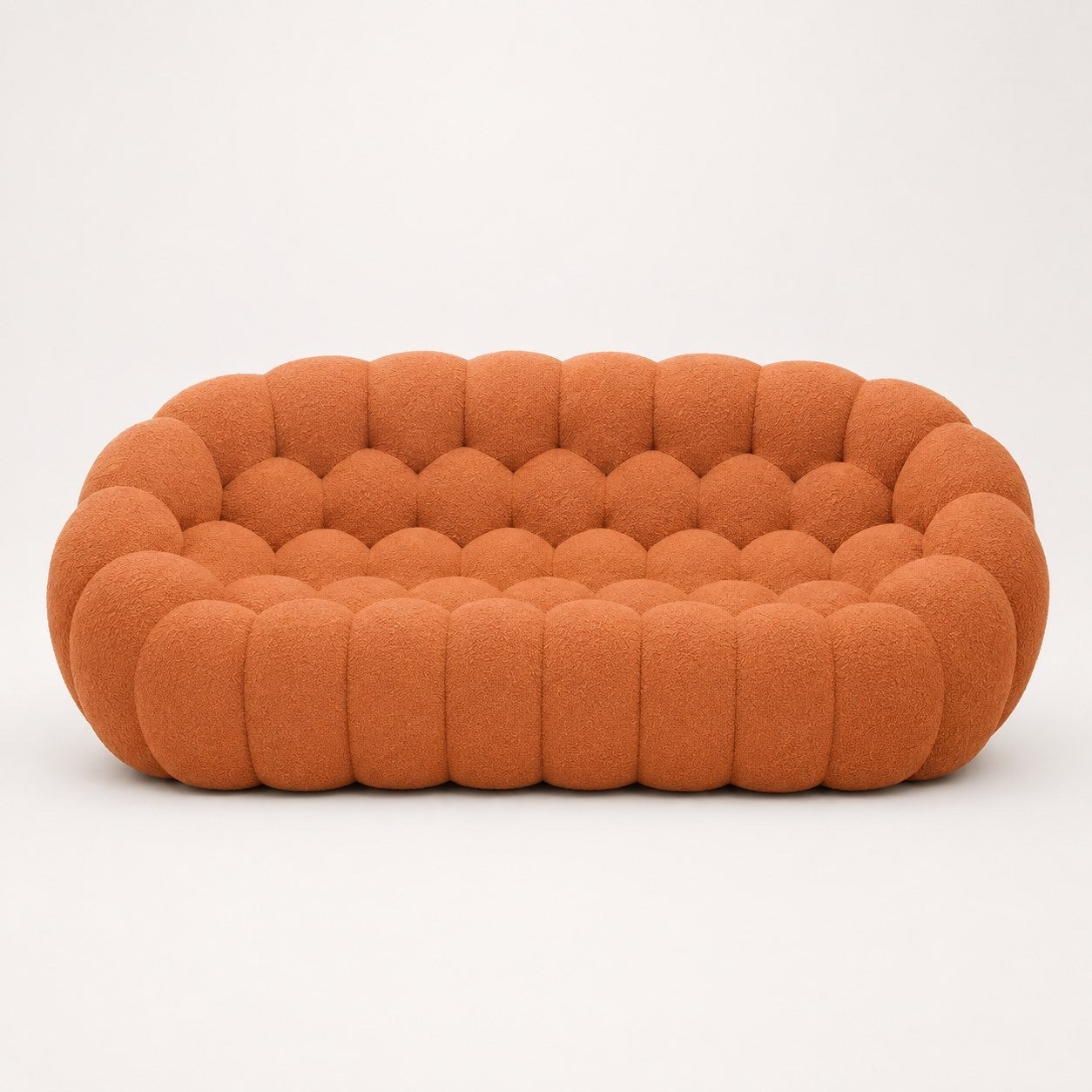 Canapé Rousseau 3-4 places en maille bouclette Terracotta, vu de face sur fond studio — Orbe Paris