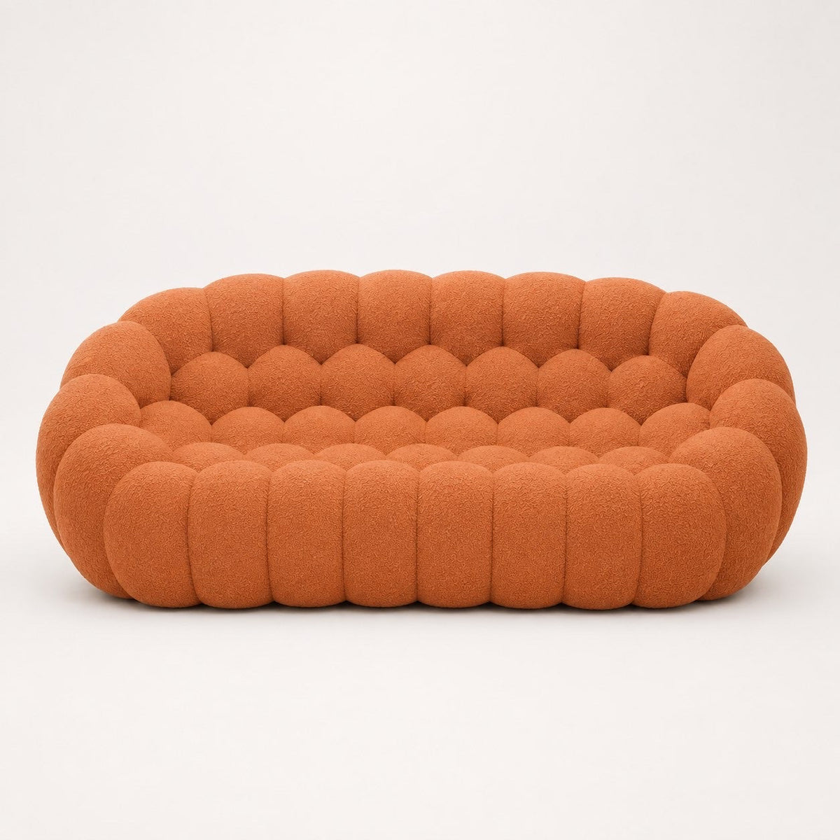 Canapé Rousseau 3-4 places en maille bouclette Terracotta, vu de face sur fond studio — Orbe Paris