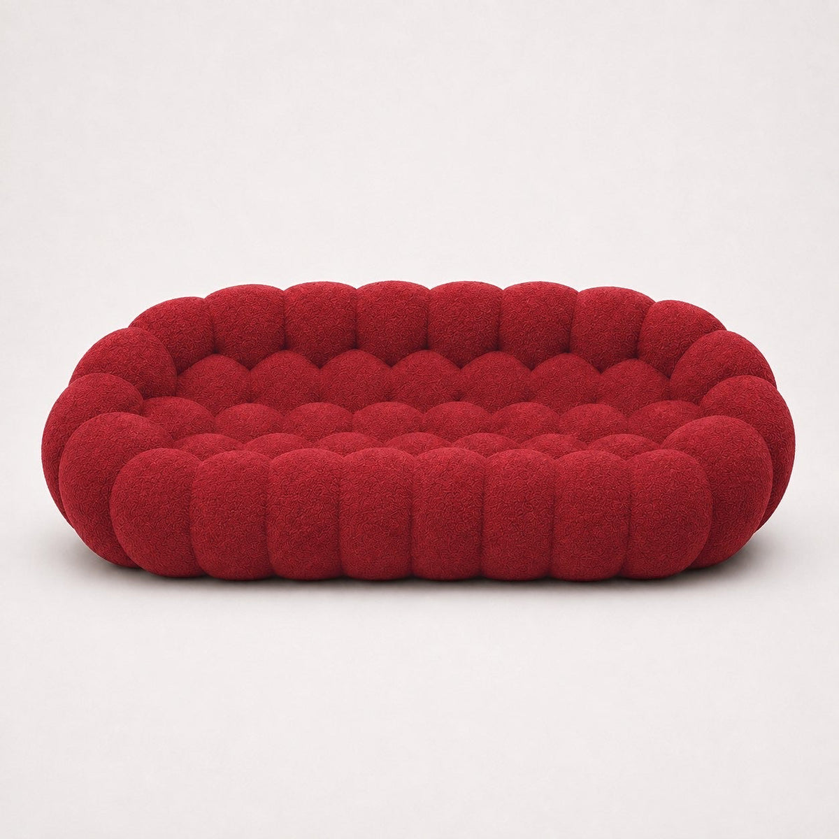 Canapé Rousseau 3-4 places en maille bouclette Rouge profond, vu de face sur fond studio — Orbe Paris