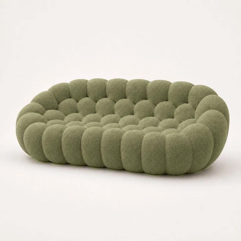 Canapé Rousseau 3-4 places en maille bouclette Vert sauge, vu de profil sur fond studio — Orbe Paris