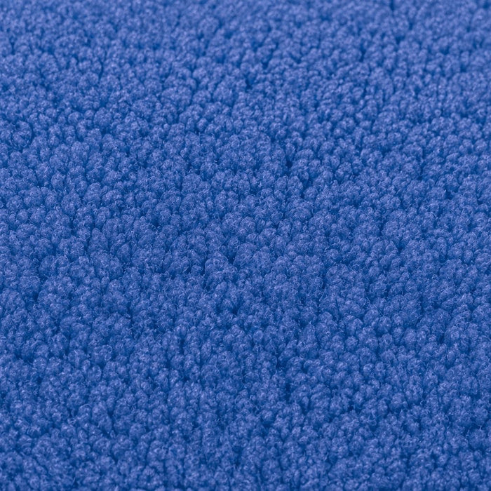 Gros plan de la maille bouclette Orbe Paris, coloris Bleu roi.