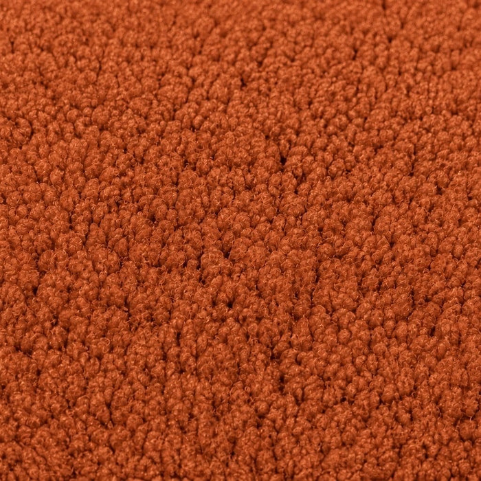 Gros plan de la maille bouclette Orbe Paris, coloris Terracotta.