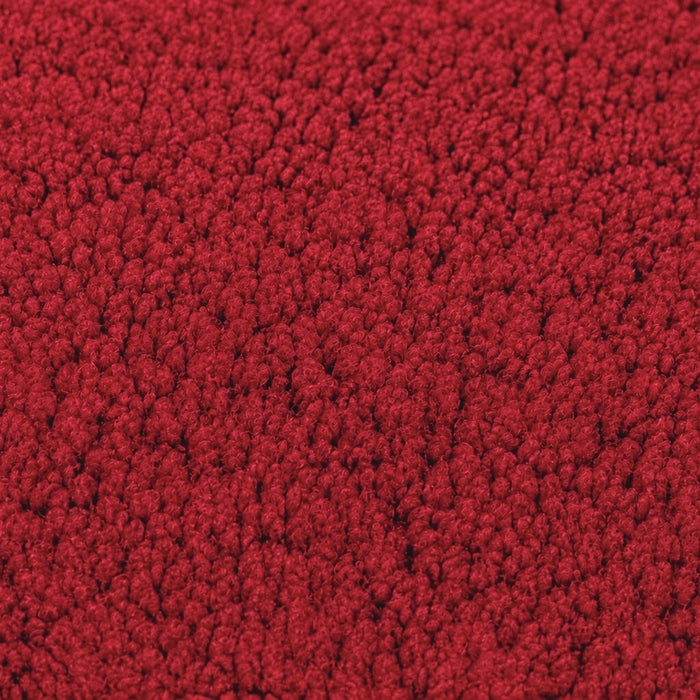 Gros plan de la maille bouclette Orbe Paris, coloris Rouge profond.