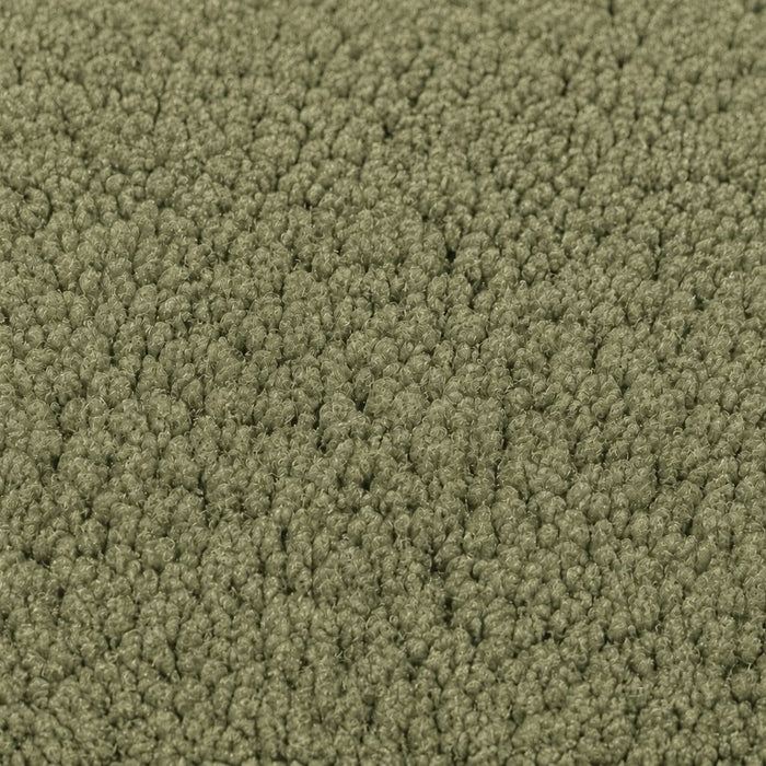 Gros plan de la maille bouclette Orbe Paris, coloris Vert sauge.