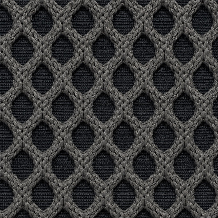Gros plan du tissu technique Orbe Paris, teinte Gris anthracite — relief alvéolé visible.