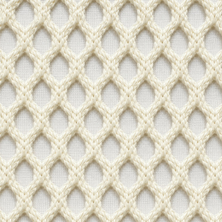 Gros plan du tissu technique Orbe Paris, teinte Blanc cassé — relief alvéolé visible.